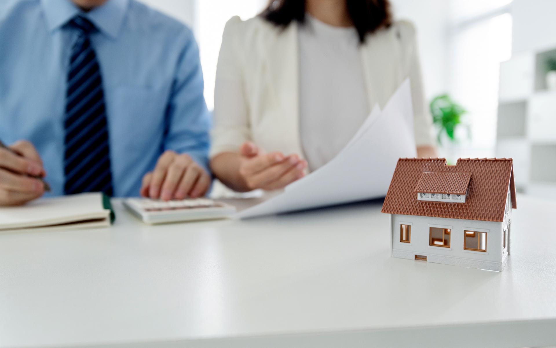 Real estate agent working on office